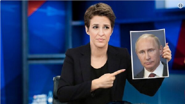 Американская ведущая всю передачу тыкала пальцем в портрет Путина